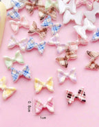 Boucles pqt 50 carreauté - Ongles Elaine Lemay