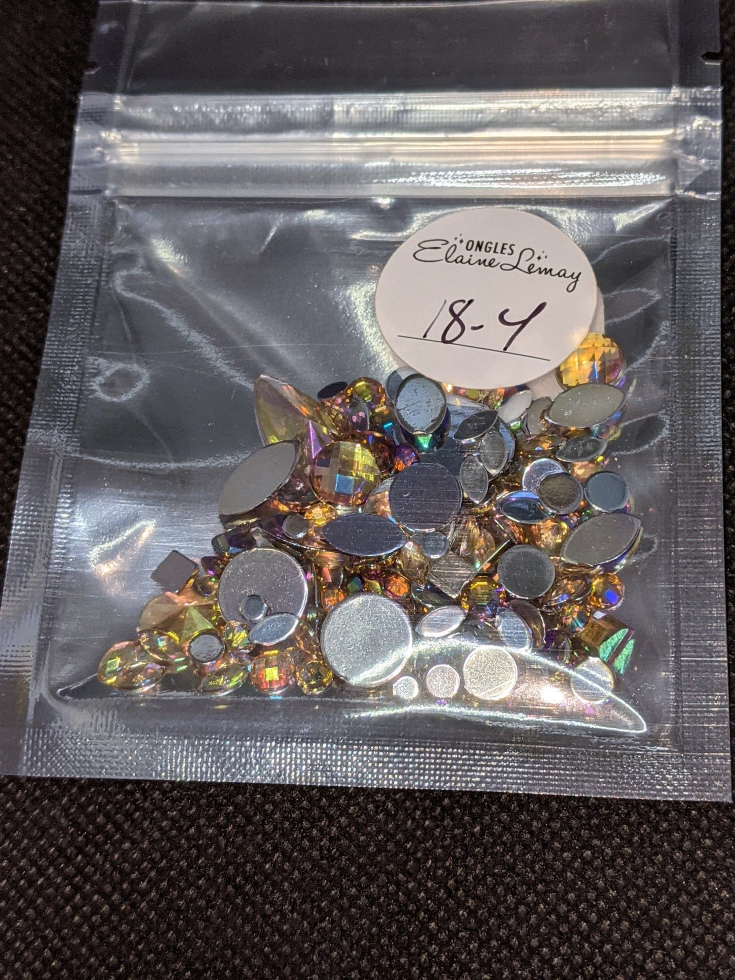 Bijoux mix en sachet 18 couleurs différentes
