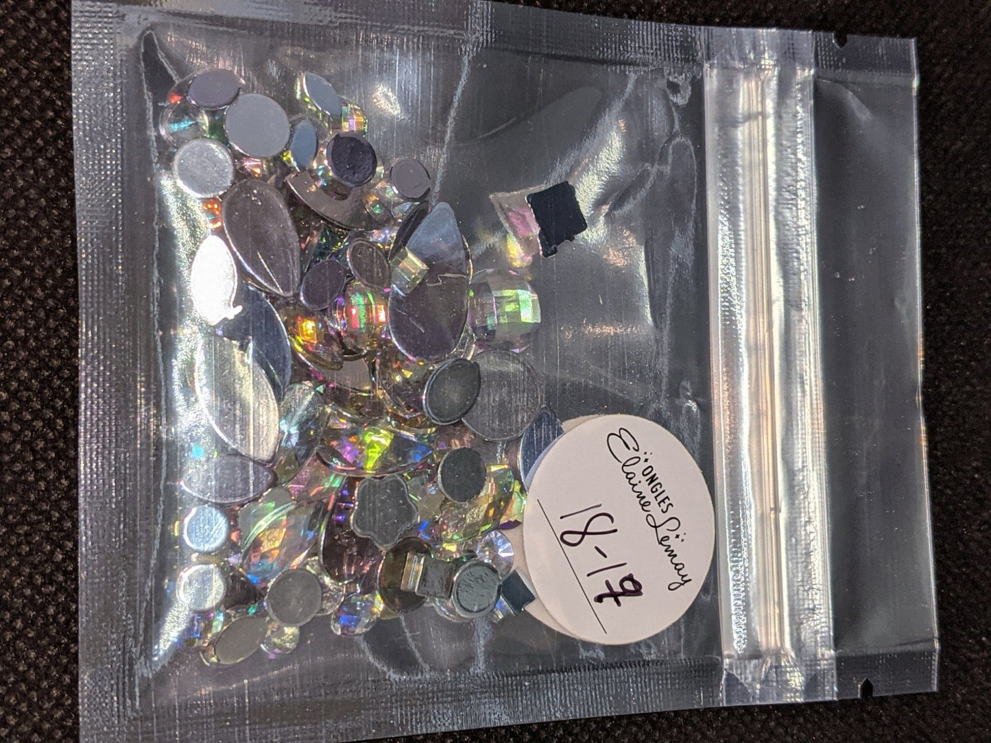 Bijoux mix en sachet 18 couleurs différentes