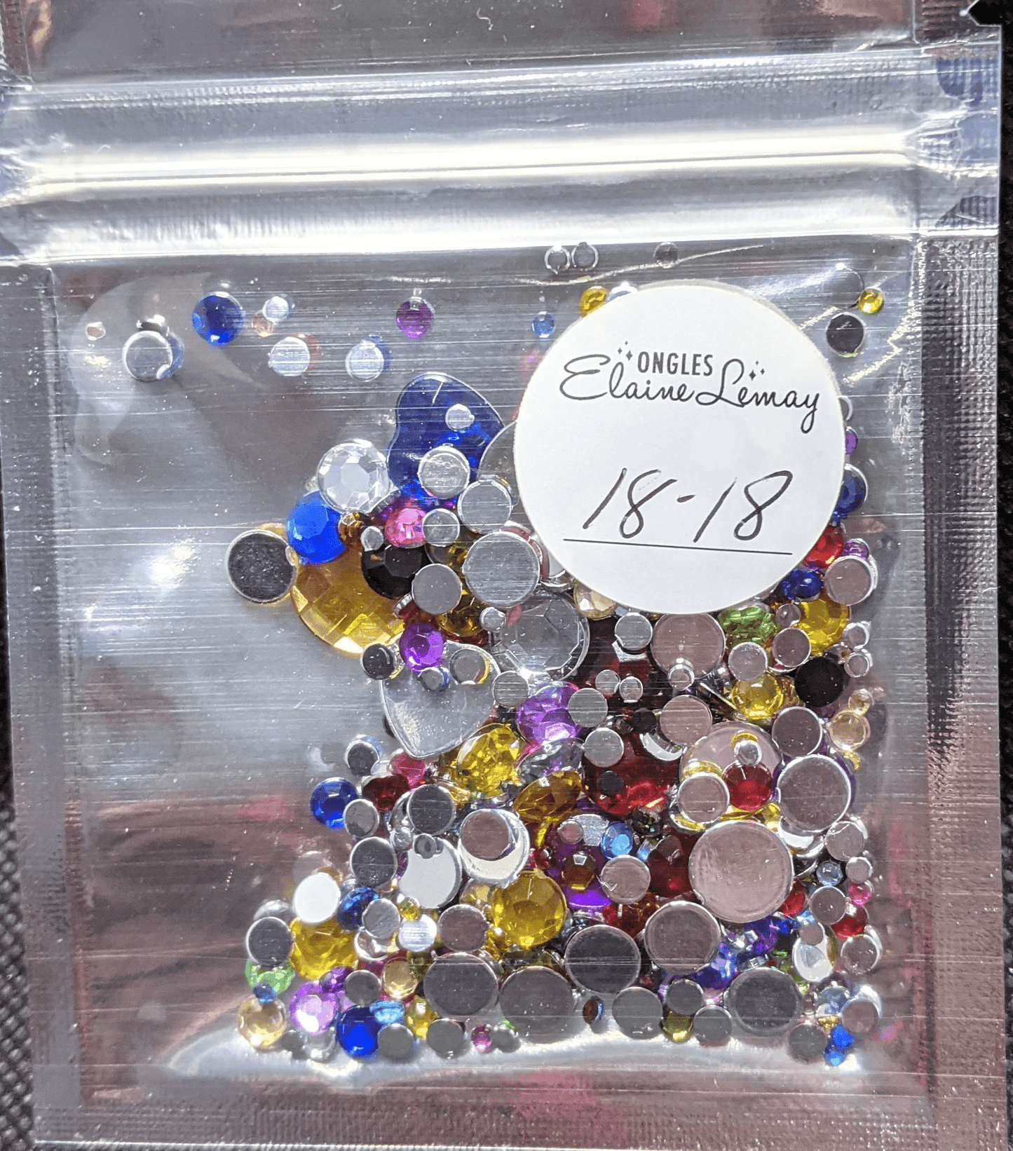 Bijoux mix en sachet 18 couleurs différentes