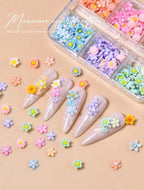 Boitier fleurs 3D pastel - Ongles Elaine Lemay
