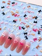 Boucles/noeud mini pqt de 100 neutre - Ongles Elaine Lemay