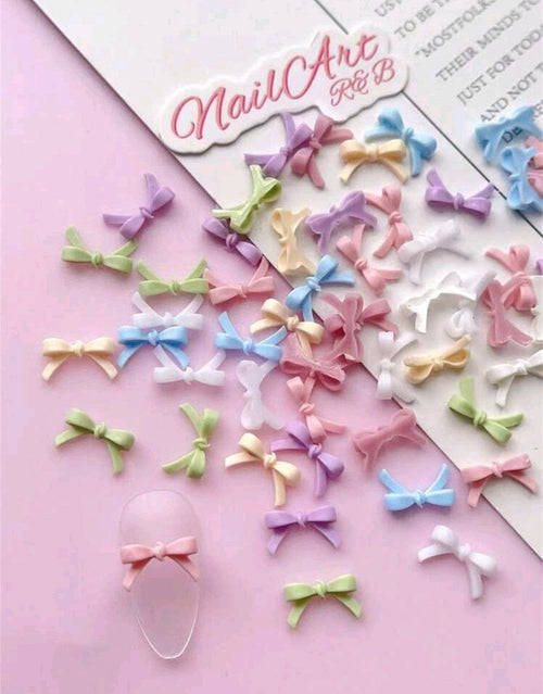 Boucles/noeud mini pqt de 100 pastel - Ongles Elaine Lemay