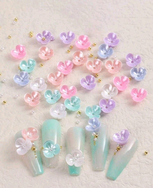 Fleurs coquilles multicolore - Ongles Elaine Lemay