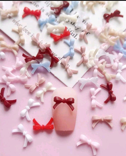 Boucles pqt 50 - Ongles Elaine Lemay 