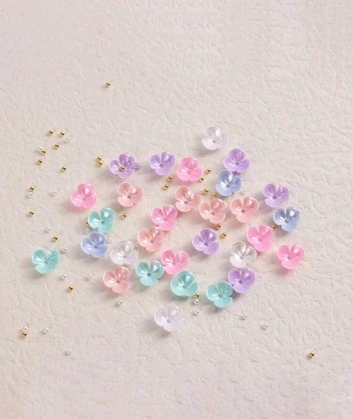Fleurs coquilles multicolore - Ongles Elaine Lemay 